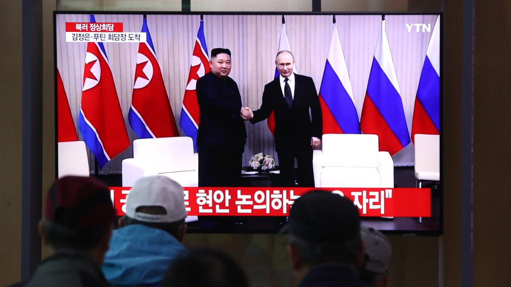 Koreans watch Kim Jong Un and Vladimir Putin shake hands on TV
